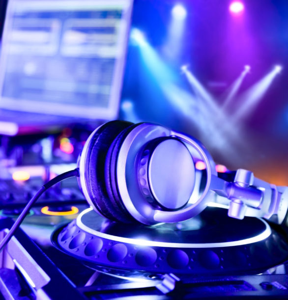 Dj mixer with headphones Dj mixer with headphones at nightclub