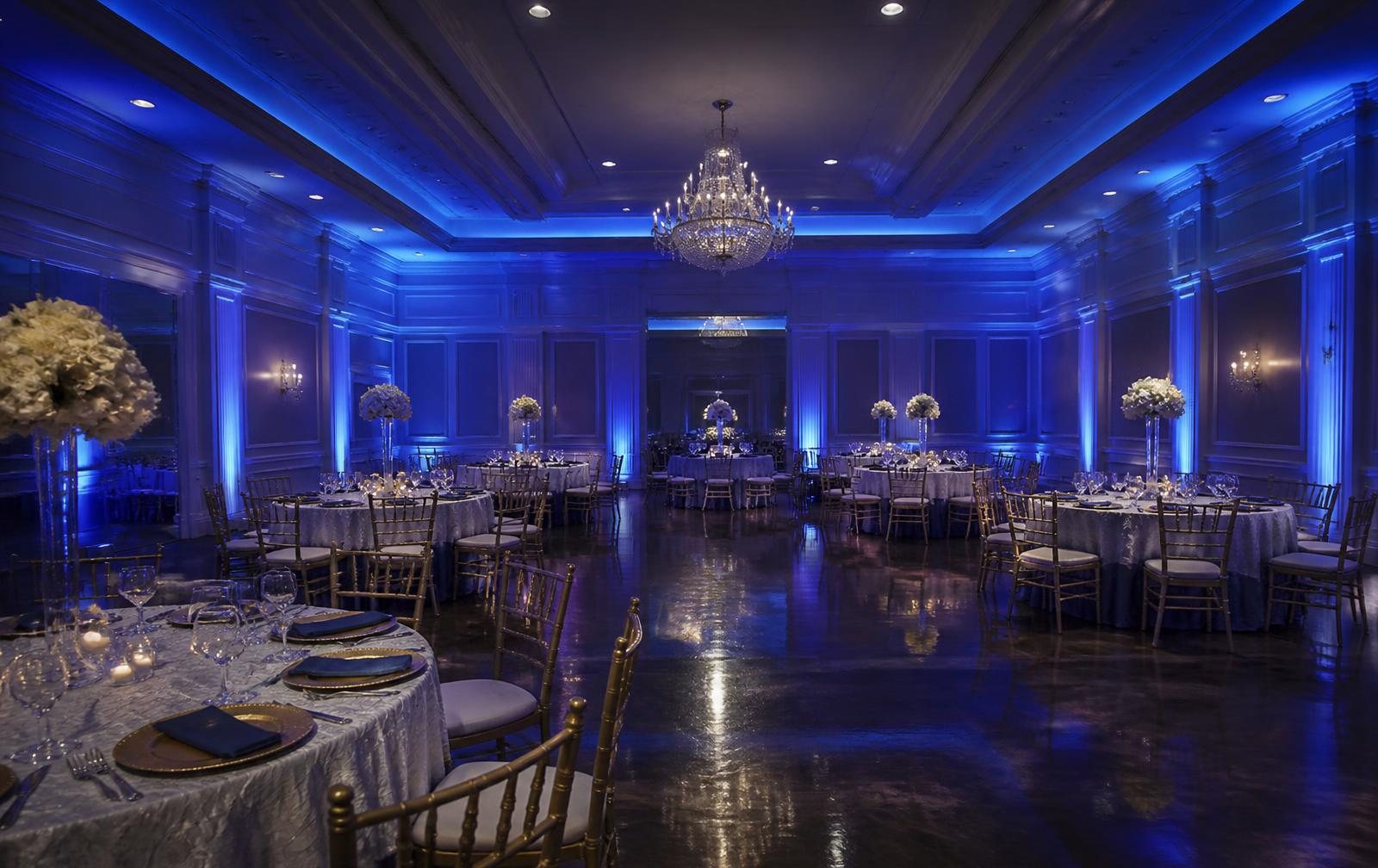 Ballroom washed in architectural uplighting