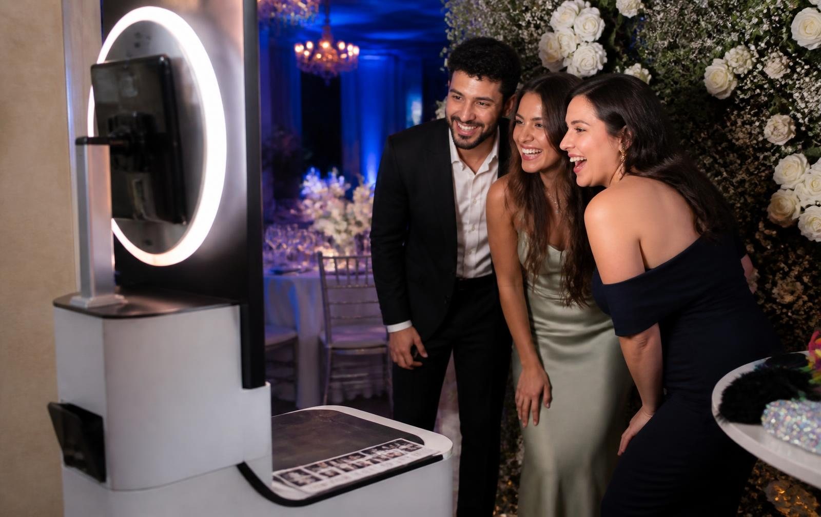 Guests using an open-air photo booth at an Arabic wedding