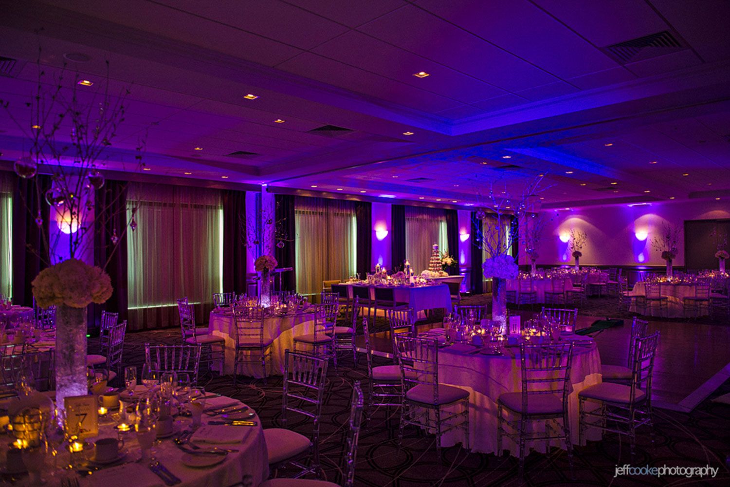 A wedding reception with purple uplighting at the Prince George Hotel