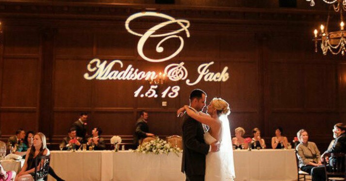 Wedding monogram projected on a reception wall