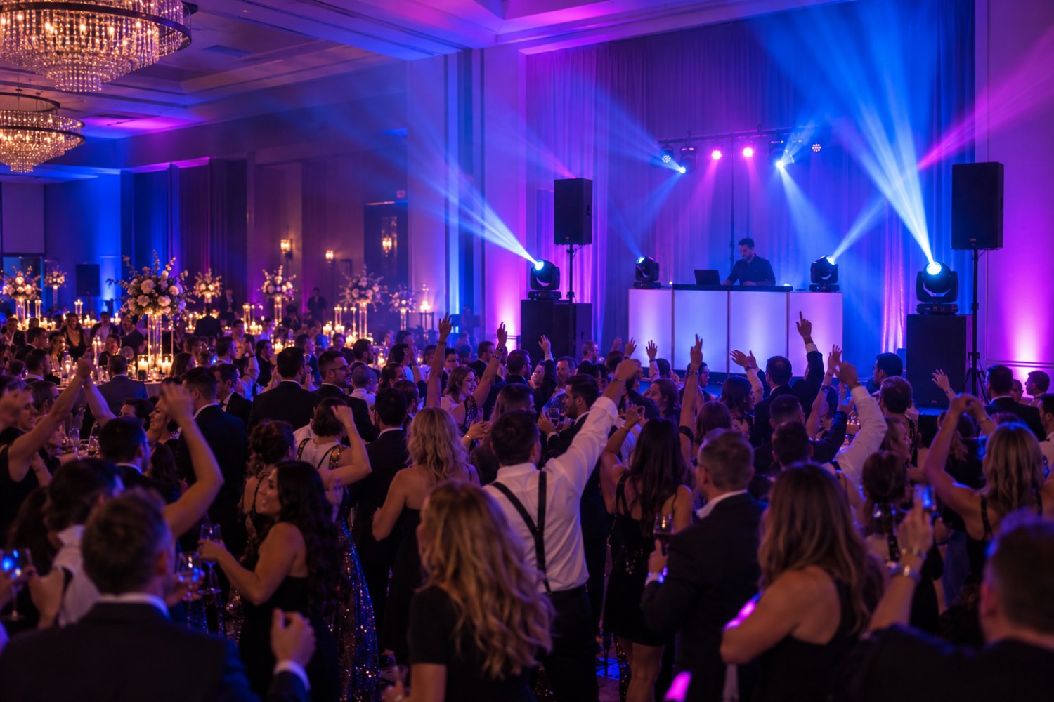 Event Premium package: packed ballroom dance floor with subwoofers and large moving-head lights